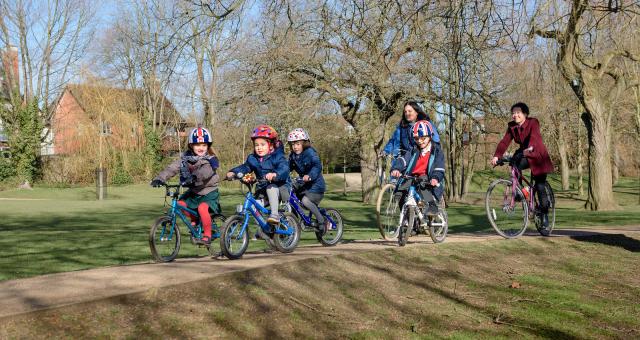 Children learning the fun side of cycling at an early age